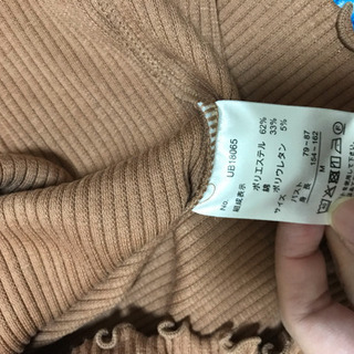 ベイクドカラートップス フリルの画像