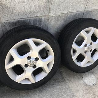 キューブ純正アルミ タイヤの画像