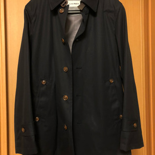新品タグ付きメンズコートの画像