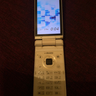 携帯電話　ガラケー docomo　SH-06A ホワイトの画像