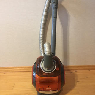 掃除機とクイックルワイパーの画像