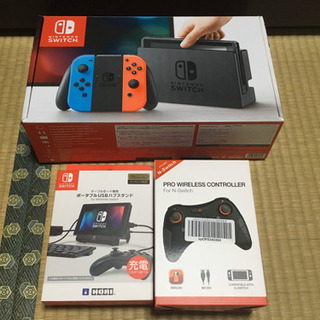 商談中　Nintendo Switch 中古本体　コントローラー　スタンド付きの画像