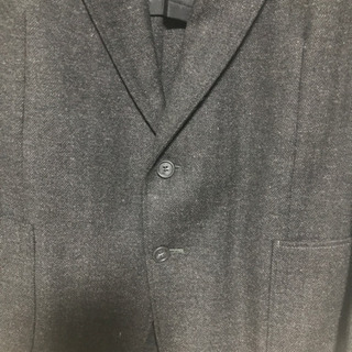 スーツ ジャケット 上の画像