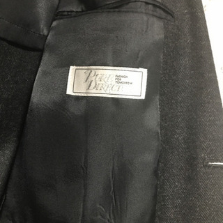 スーツ ジャケット 上の画像