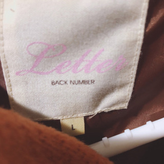 コート オレンジの画像