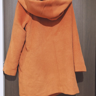 コート オレンジの画像