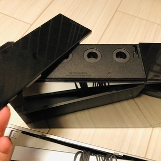 Wii本体＋リモコン２つ＋ソフト７本の画像