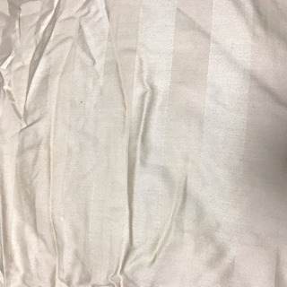 掛け布団、ベージュのカバー付きの画像