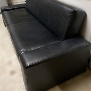 黒いソファー　商談成立の画像