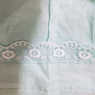 春色の新品かわいいエプロン。