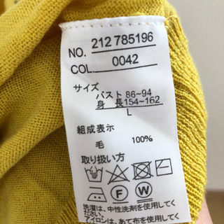 毛100%薄手ニットの画像