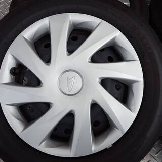 軽自動車用 14ｲﾝﾁｽﾁｰﾙﾎｲｰﾙｾｯﾄ ﾎｲｰﾙｷｬｯﾌﾟ付き中古4本の画像