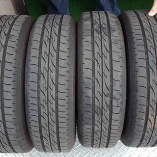 軽自動車用 14ｲﾝﾁｽﾁｰﾙﾎｲｰﾙｾｯﾄ ﾎｲｰﾙｷｬｯﾌﾟ付き中古4本の画像