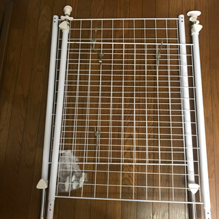 洗濯機横　縦に突っ張る網