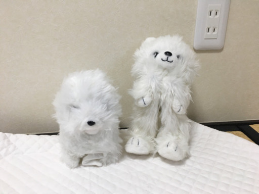 スイッチを入れると回転する犬のぬいぐるみ