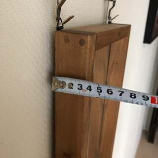 木製枠の小さな姿見の画像