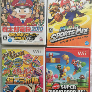 取り引き中【Wii関連】　ソフト4点　リモコン2点　攻略本セットの画像