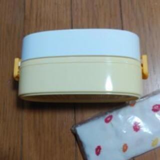 未使用のお弁当箱とお弁当箱入れの画像