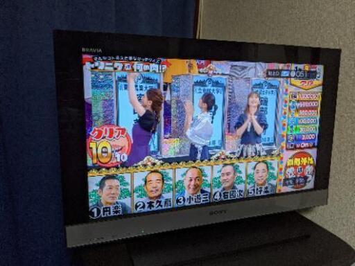液晶テレビと台とVHS とDVDプレイヤー