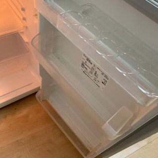 無印良品の冷蔵庫、日立の電子レンジの画像