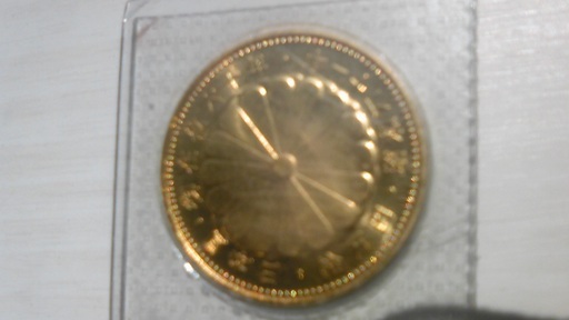 １０万円金貨と１万円銀貨　ケース入