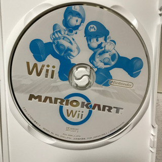 wii本体とディスク5枚の画像