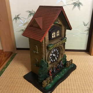 レトロなイメージのカラクリ時計　電池式の画像