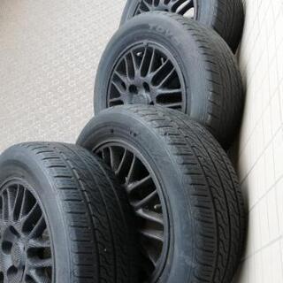 日産ローレル純正のアルミホイール4本セット、カーボン調テクスチャ...