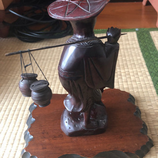 釣老師、木彫りの彫刻の画像