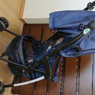 アップリカ マジカルエアー プラス レインカバー付きの画像