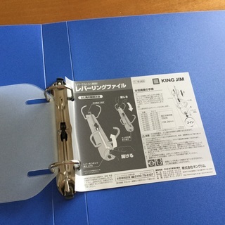 ファイルとボールペン(取引中)の画像