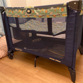 GRACO折りたたみベビーベッドの画像