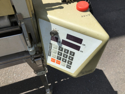 クロス糊付機