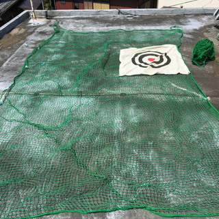 トスバッティングマシーンとネットの画像