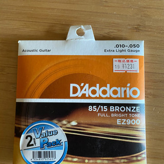 中古アコースティックギターとカポ+スペアの弦+ピックの画像