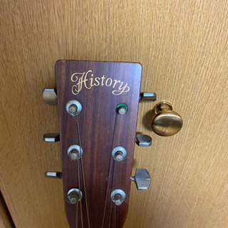 中古アコースティックギターとカポ+スペアの弦+ピックの画像