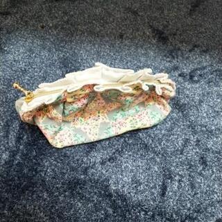 新品未使用　人気柄ポーチの画像