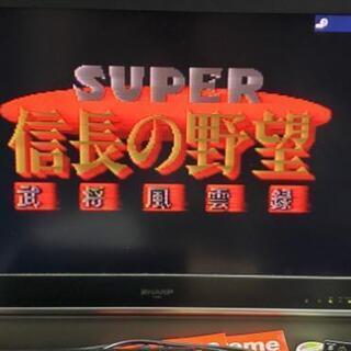 スーパーファミコン本体とコントローラー3個とソフトの画像