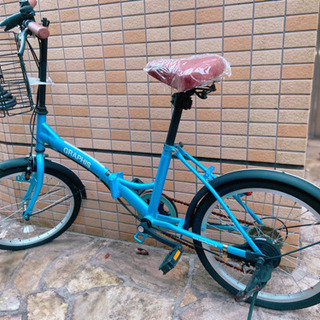 折り畳み自転車(タイヤは空気漏れかパンクしています)の画像