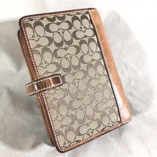 COACH コーチ キャメルブラウン レザー×キャンバスシグネチャー アジェンダPM 手帳カバー6穴の画像
