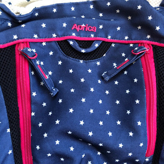 Aprica コラン デニム×ピンクの抱っこ紐の画像