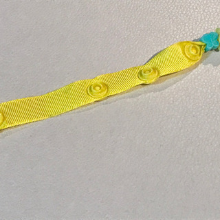 おしゃぶり・おもちゃホルダー　黄色の画像
