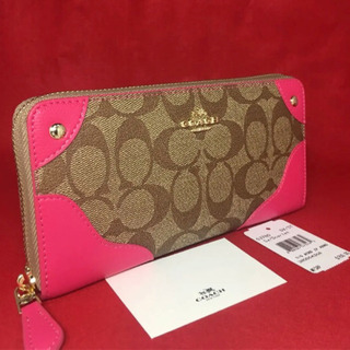 《新品未使用》COACH コーチ 長財布ピンクの画像