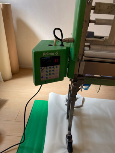 壁紙糊付機