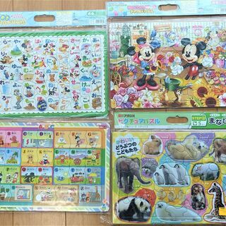 DVD2枚（ぜーんぶ！シナモン！ ・不思議の国のアリス）、パズル4枚の画像