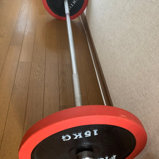 トレーニングようのベンチとバーベルです。の画像