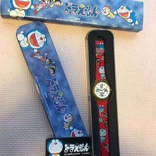 100円【本文要確認】ドラえもん腕時計(おもちゃ)/缶付き・売ります