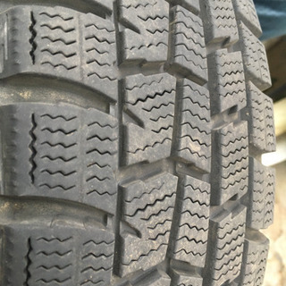 DUNLOPスタットレスタイヤ4本セット全てホイール付き155/65R13の画像