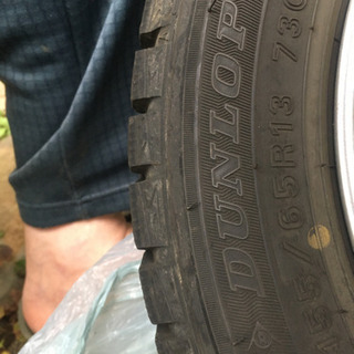 DUNLOPスタットレスタイヤ4本セット全てホイール付き155/65R13の画像