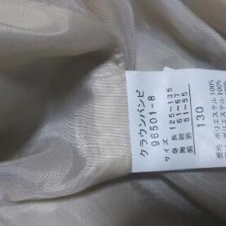 女の子 ベージュ上着 130の画像